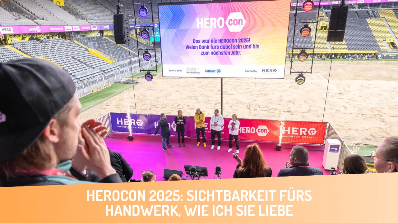 HEROCON 2025 Abschluss auf der HERO Stage mit Team vor LED-Leinwand im Signal Iduna Park. 